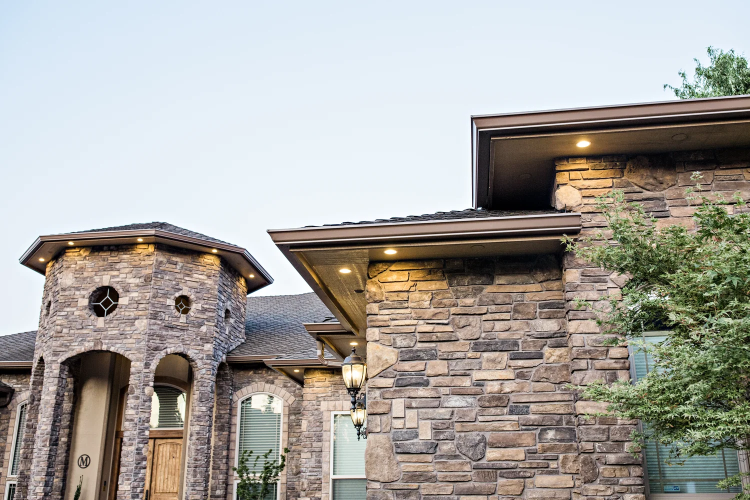 Gutter install prep with ladder, tools, and downspout layout on the lawn, Fisher's Landing WA area